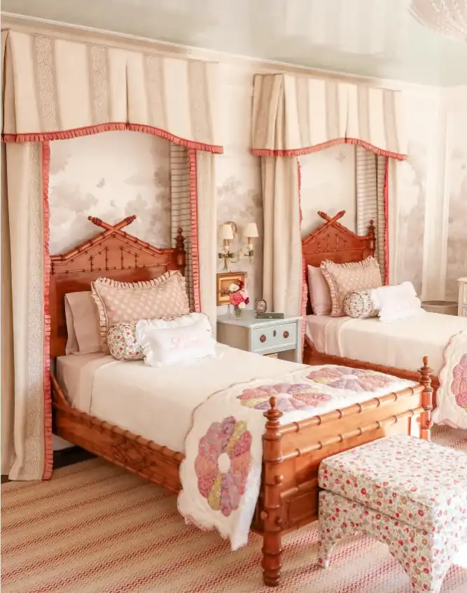 Vintage feminine bedroom ideas for girls with canopy beds, floral murals, and monogrammed linens