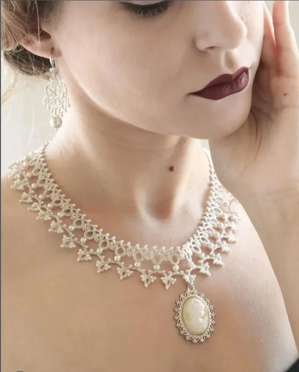 Delicate lace bracelet and choker set, lightweight handmade lace products for bridal and cottagecore fashion, customizable with charms.