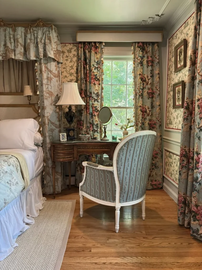 Vintage feminine bedroom ideas with mixed patterns, toile fabrics, and classic antique furniture
