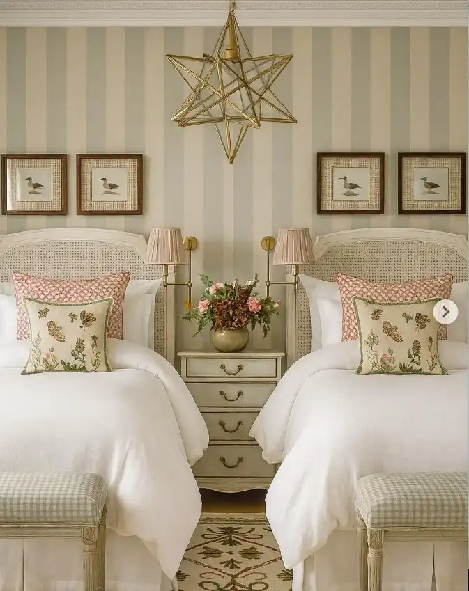 Vintage feminine bedroom ideas featuring twin beds with toile and tweed fabrics in English country style