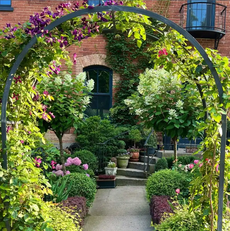 backyard garden ideas wooden garden arbor entrance with flowers