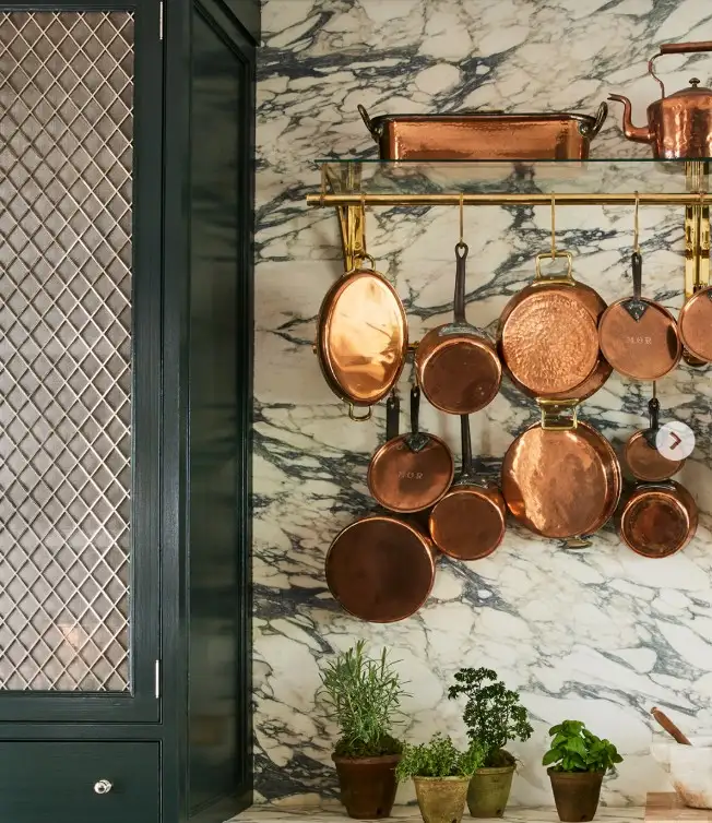 wall hooks in kitchen used for hanging mugs and utensils simple and practical wall storage