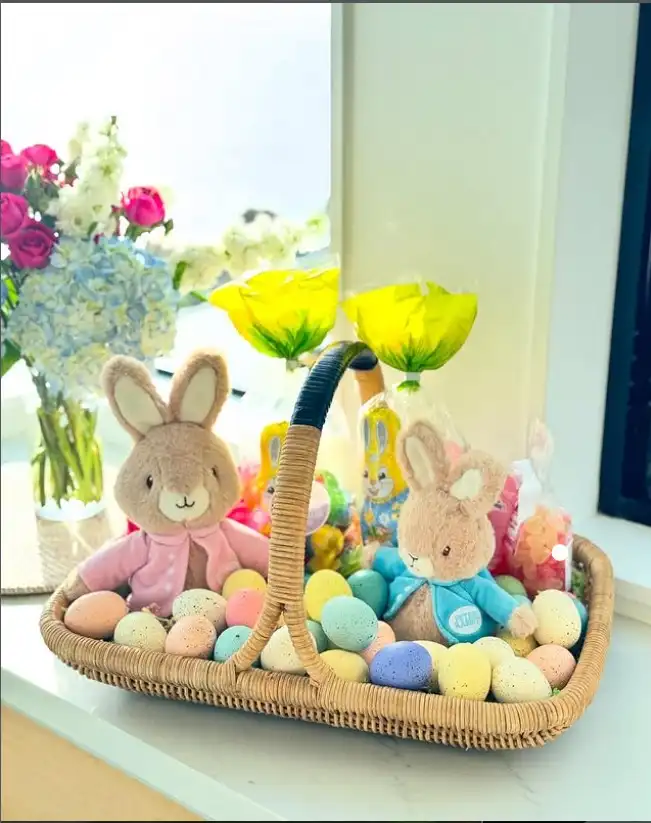 spring themed easter baskets for adults with flowers chocolates and pastel gifts