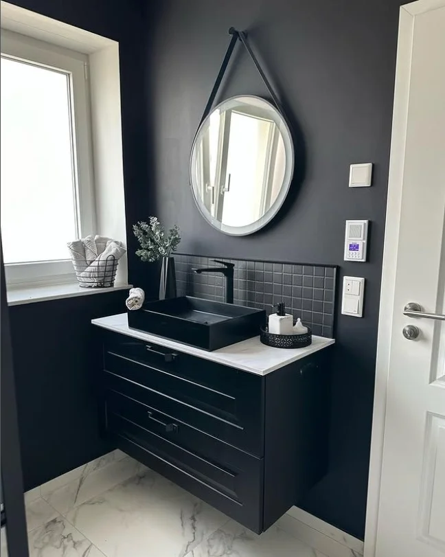 modern bathroom wall decor ideas with black metal accents