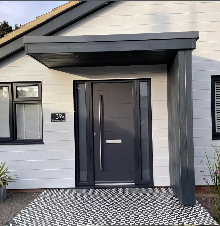 bungalow front porch with bold painted front door curb appeal