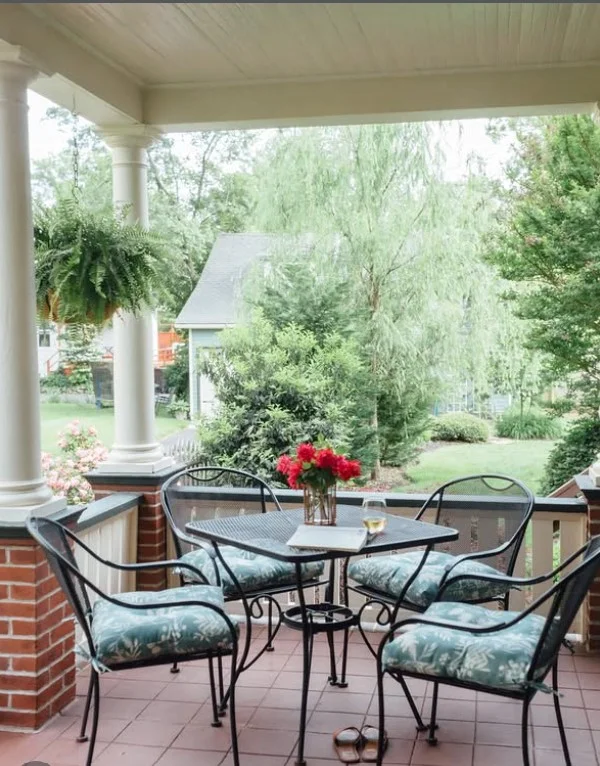 small side porch with cozy corner seating setup