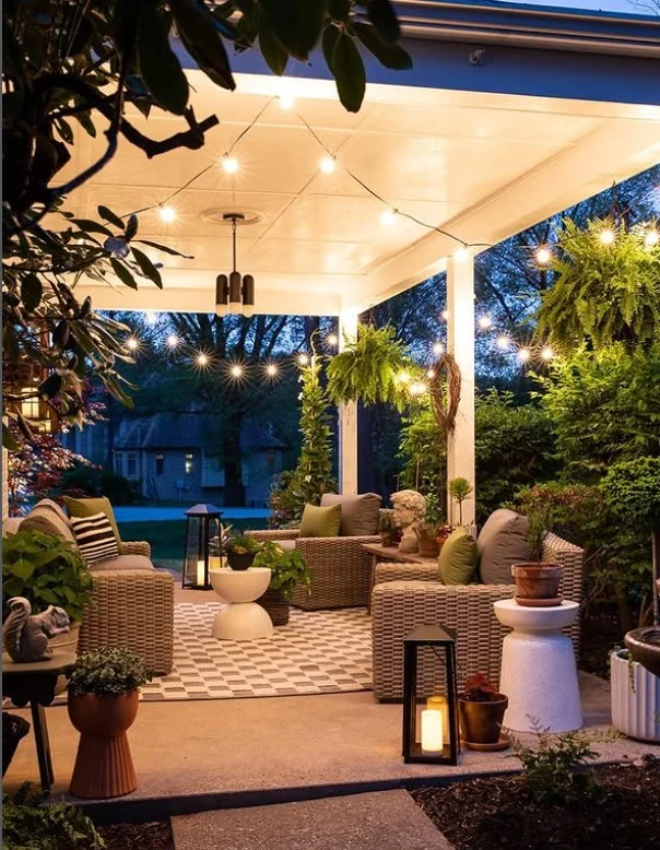 small side porch with hanging lantern lights