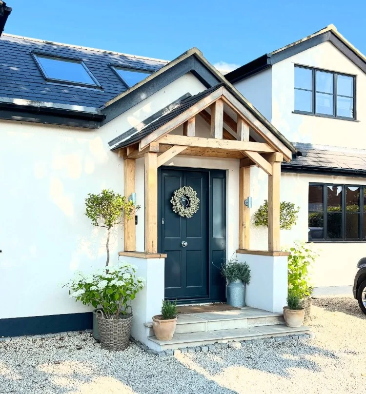 bungalow front porch with outdoor rug and styled seating area