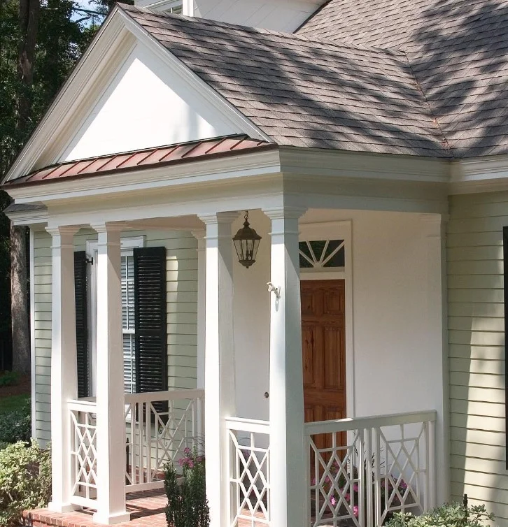 bungalow front porch with updated railings and fresh trim paint
