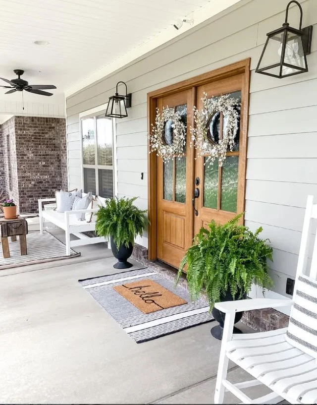tiny front porch with slim bench seating and clean layout