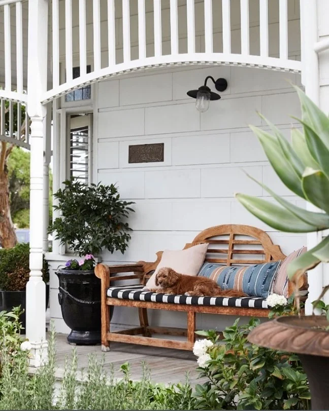 townhouse front porch with slim bench seating and clean layout