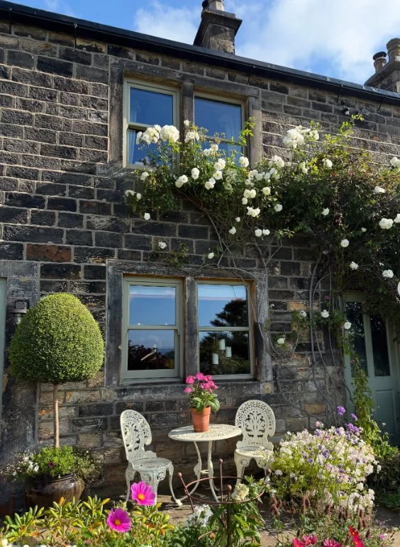 small side porch with small bistro set seating area