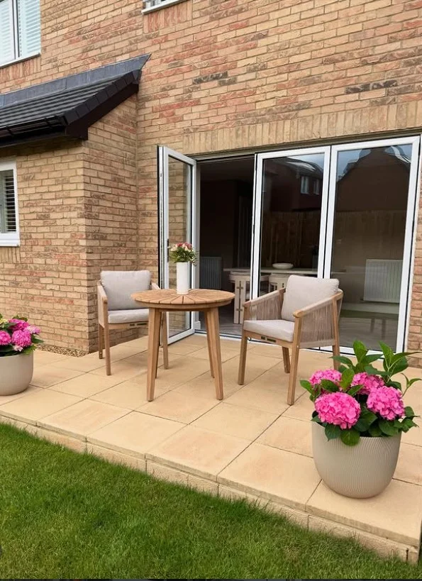 townhouse front porch with small bistro set seating area