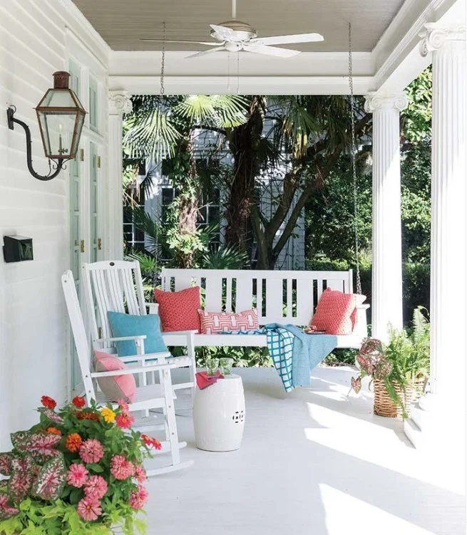 tiny front porch with small porch swing cozy setup