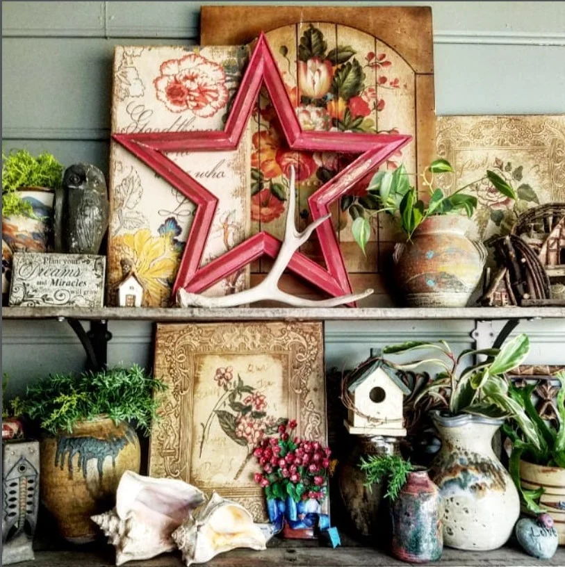 townhouse front porch with wall shelf for plants and decor