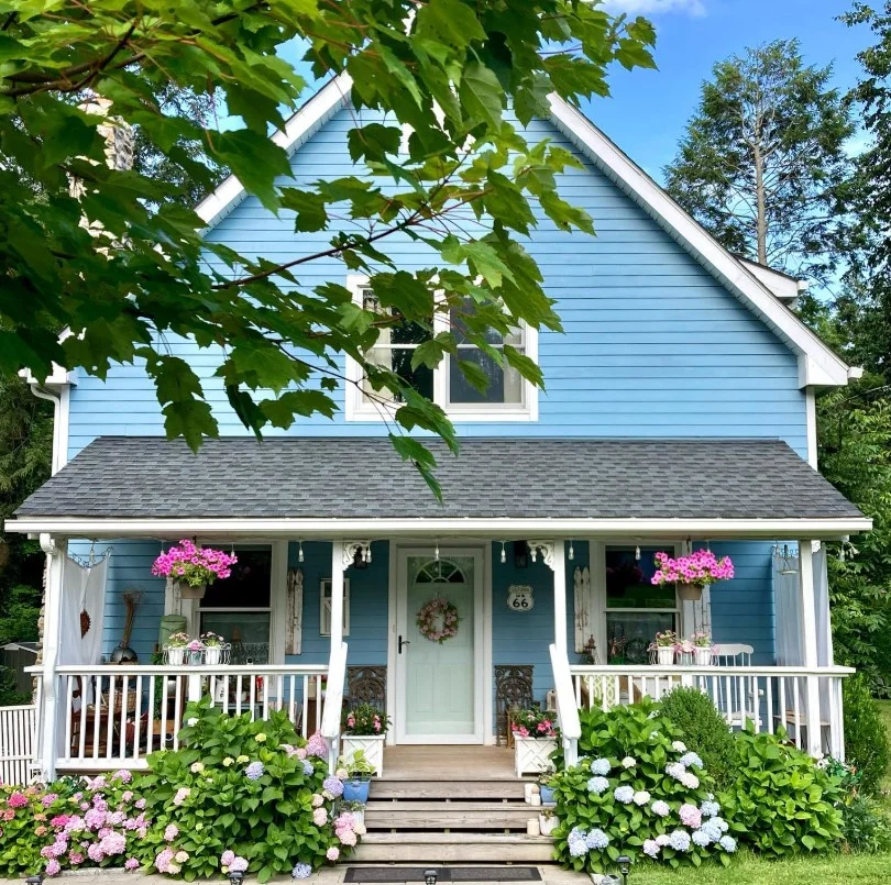 cottage front porch with soft pastel color decor design