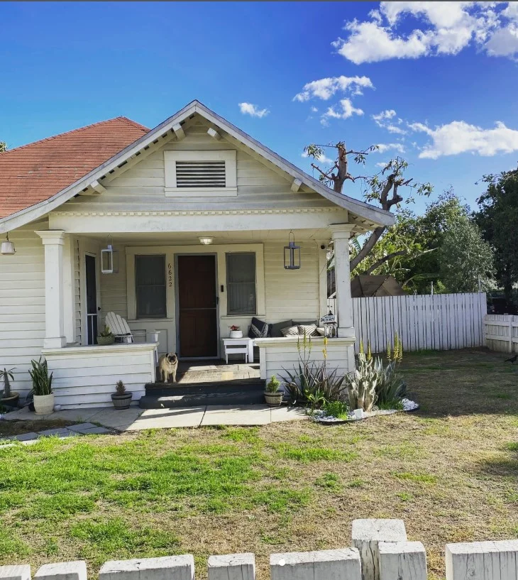 bungalow front porch with vintage decor and antique accents