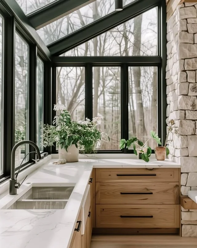 black window frames in modern four season room