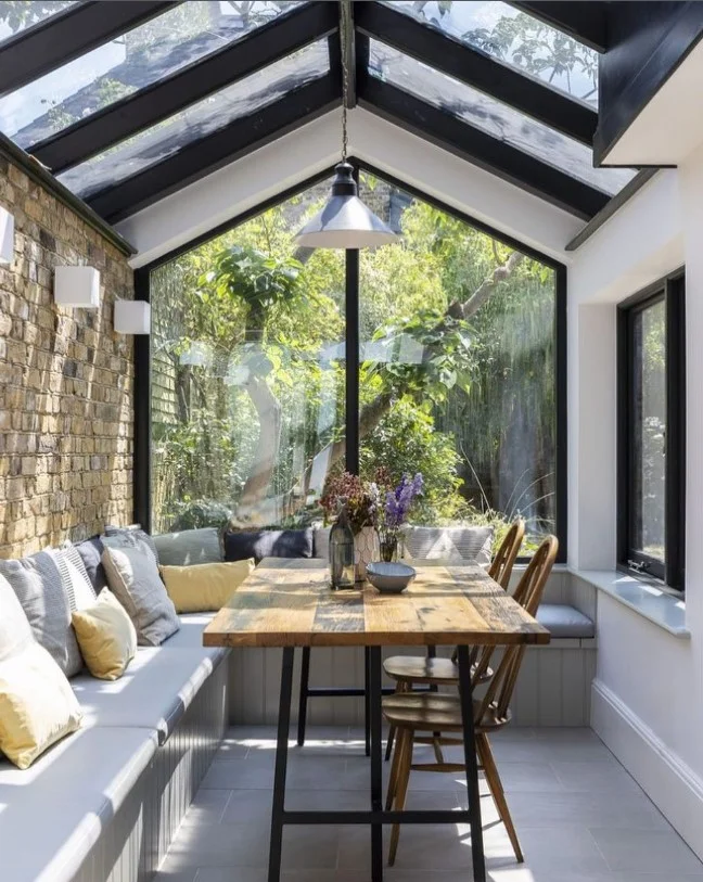 cozy seating inside 4 season room addition off kitchen