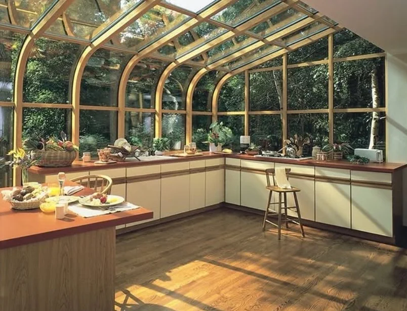 natural wood flooring in bright four season room addition