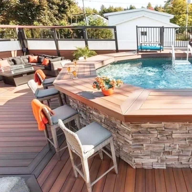 outdoor hangout area beside pool deck off house