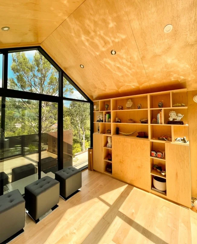 built in storage wall in modern family room design