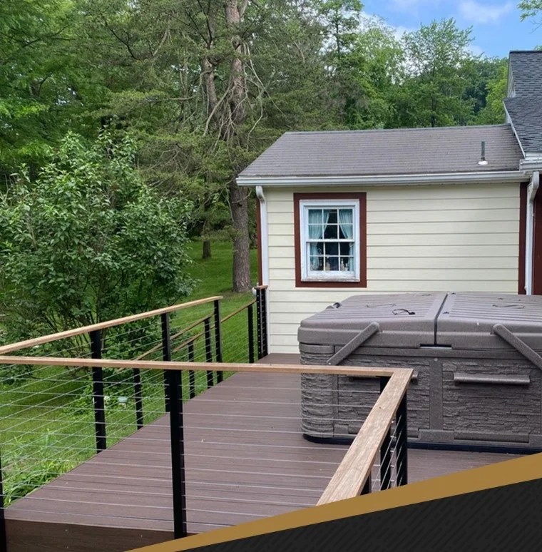 gray composite decking with black cable deck railings
