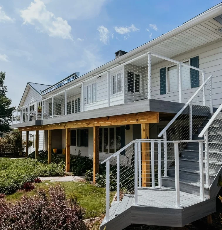 rustic wood deck mixed with modern cable railing system