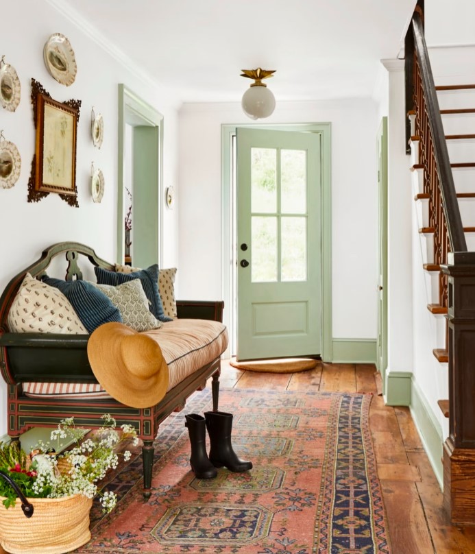 enclosed porch entrance with comfortable seating chair setup