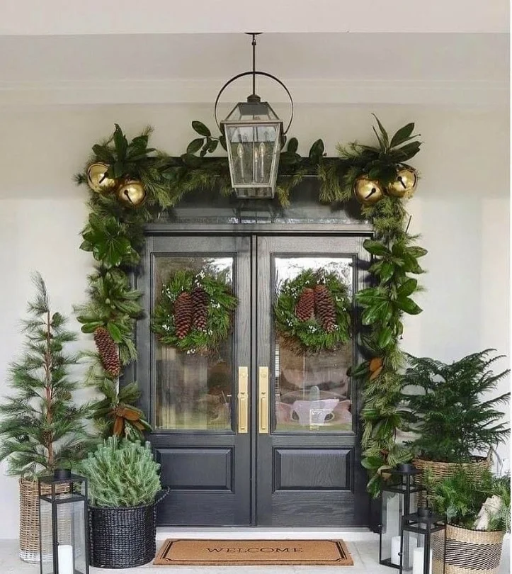 greenery framing front door small stoop elegant entry