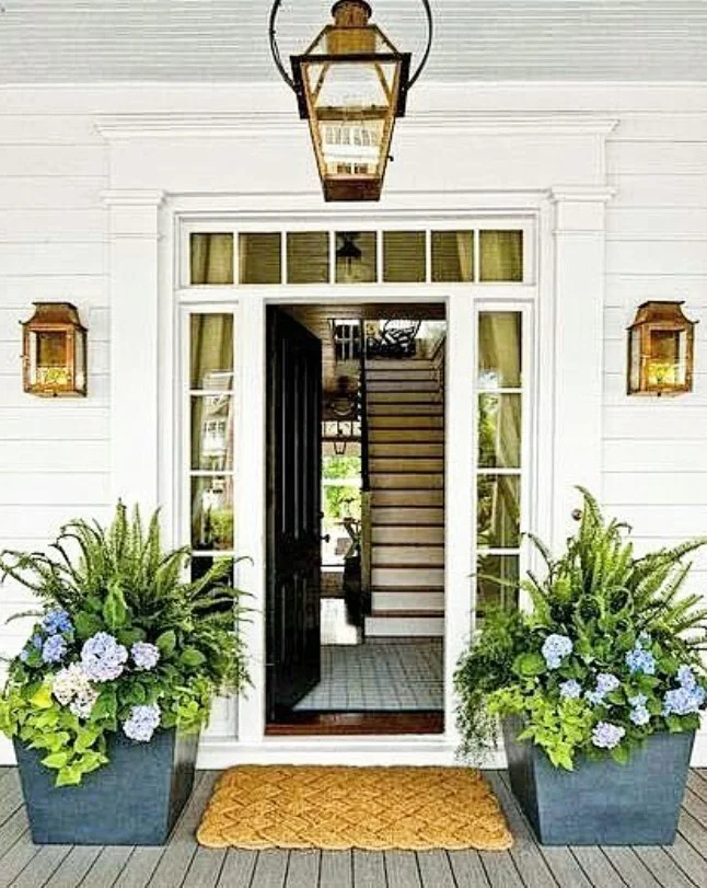 front porch entrance with hanging lantern lighting decor