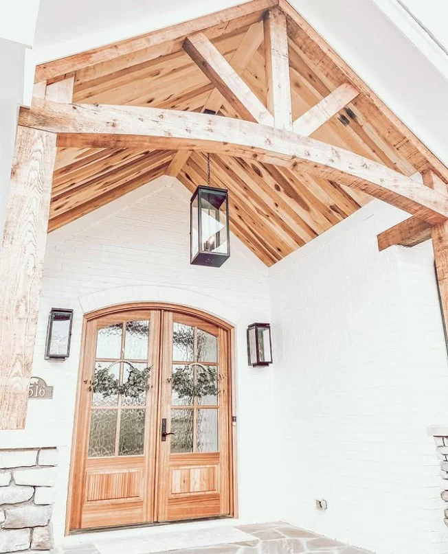 front porch with natural wood accents warm decor style