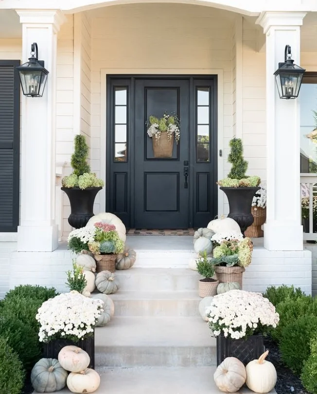 symmetrical front porch entrance with matching decor items