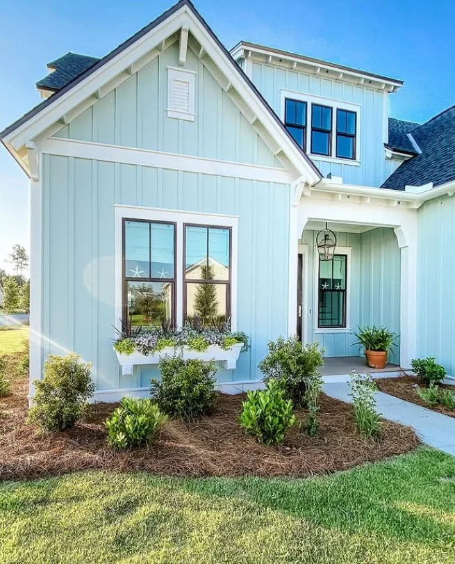 front porch with colorful flower window boxes decor