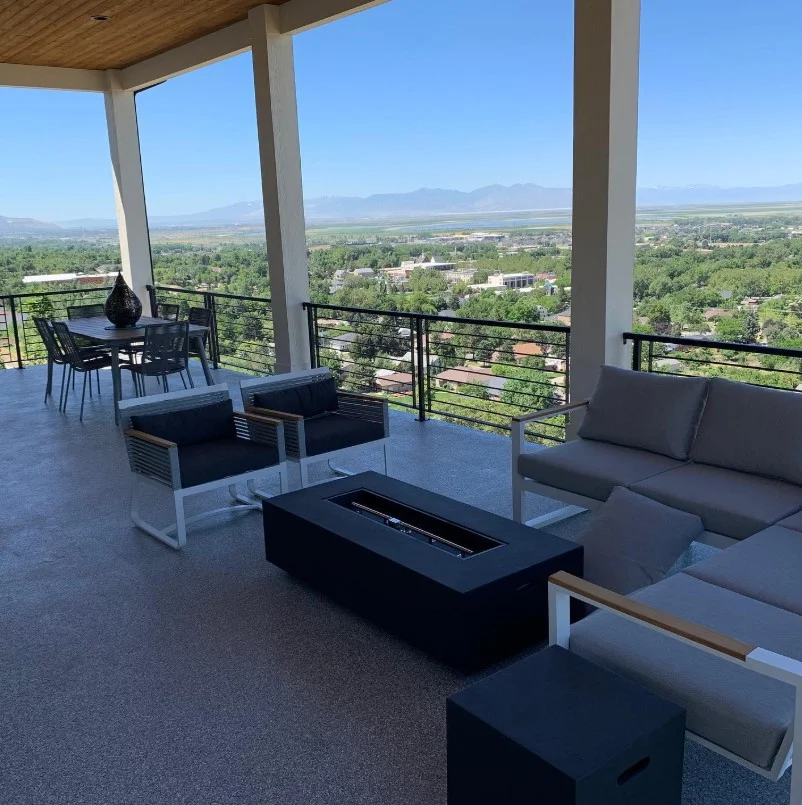 beautiful backyard gathering space with horizontal deck railing