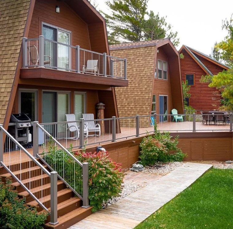 horizontal cable deck railing with modern backyard view