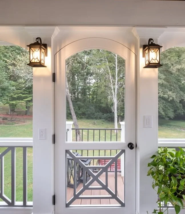 screened porch with lantern lighting warm cozy atmosphere
