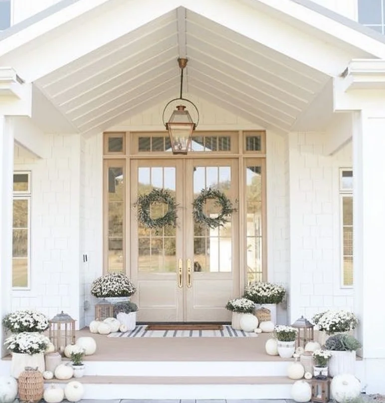 matching planters on small front stoop balanced entry design