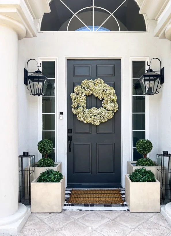 concrete planters decorating modern front entrance