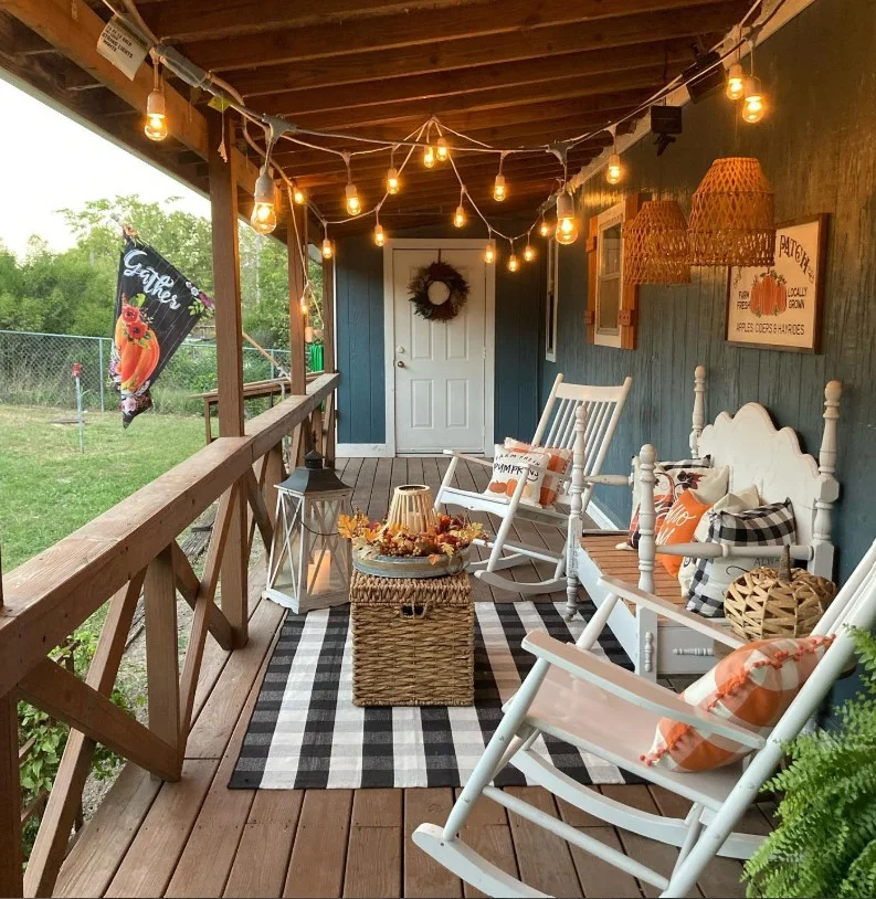 outdoor string lights around cozy front entrance