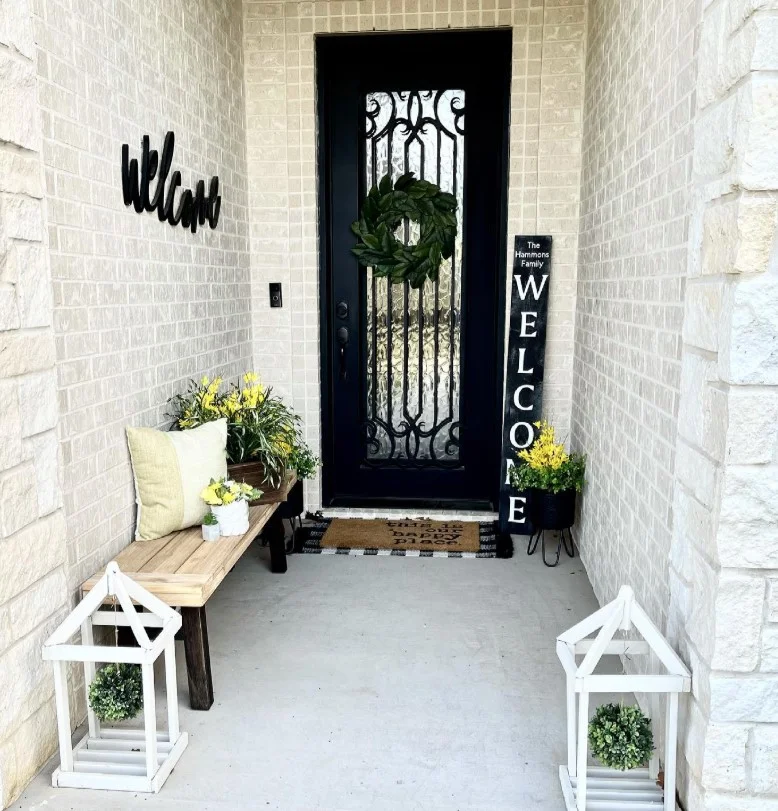 wooden bench on cozy modern front porch entrance