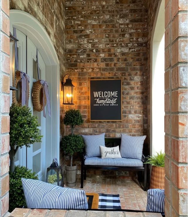 modern outdoor bench on cozy front porch