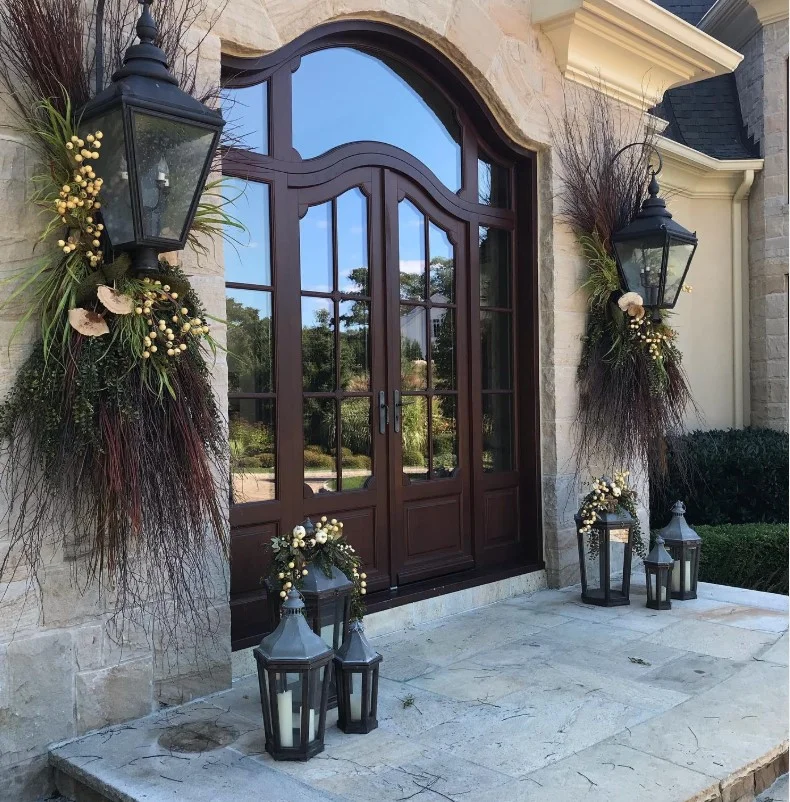 stone details around modern front porch entrance