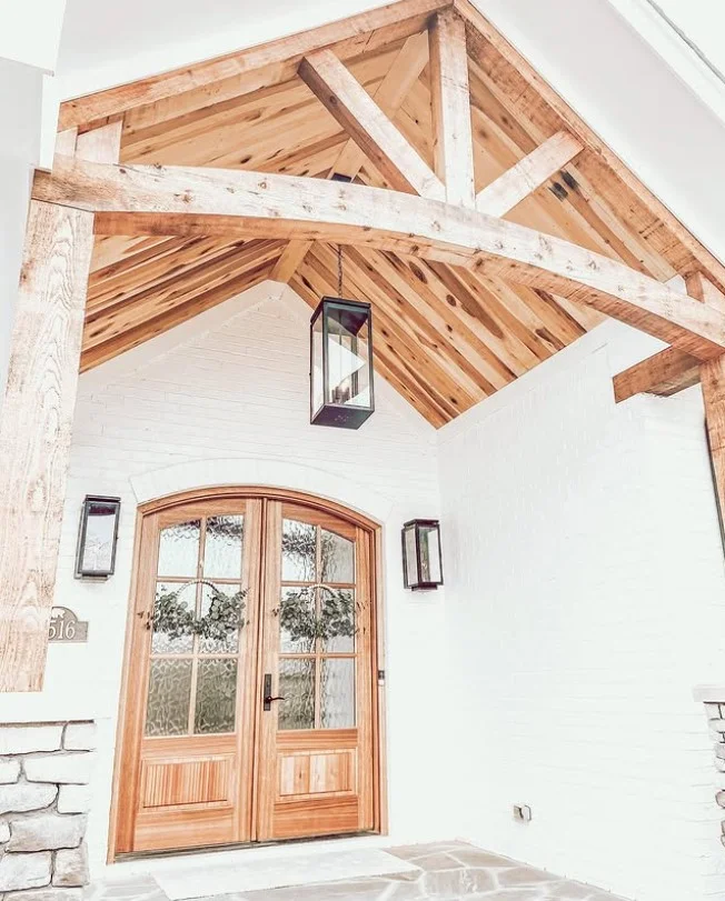 wood ceiling panels on luxury front porch