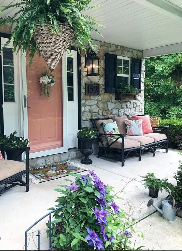 open front porch with decorative pillows cozy seating