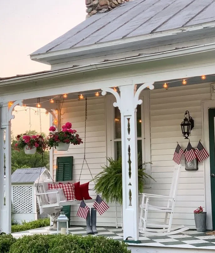 open front porch with porch swing relaxing seating idea