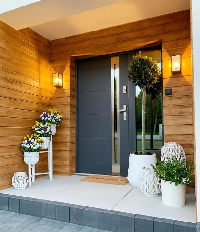 open front porch with wall lighting bright entrance