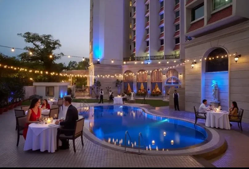 outdoor string lights around backyard pool area