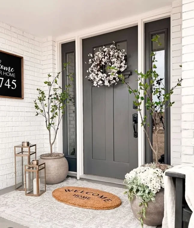 small front stoop with simple welcome mat clean entry design