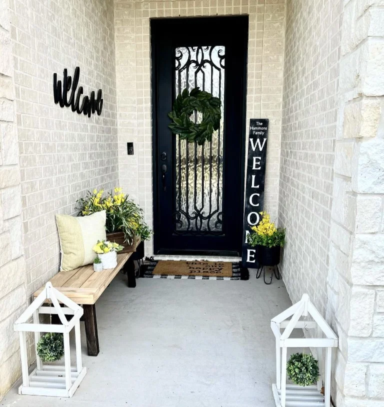 small front stoop with slim bench cozy seating idea